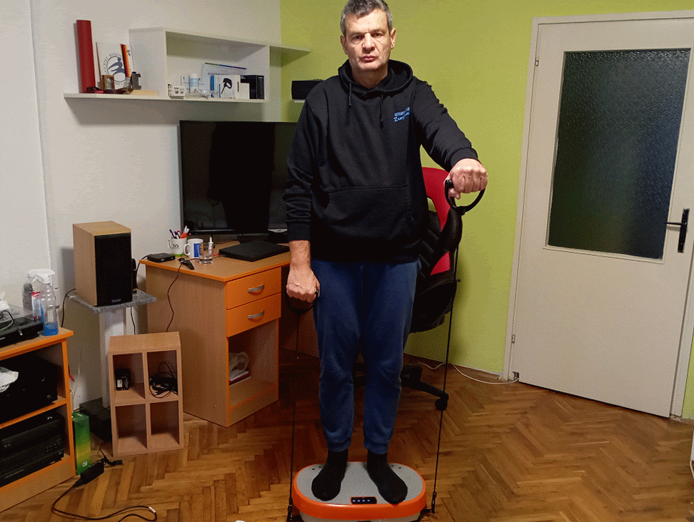 Vladimir using elastic bands on a vibration plate Vladimir using elastic bands on a vibration plate