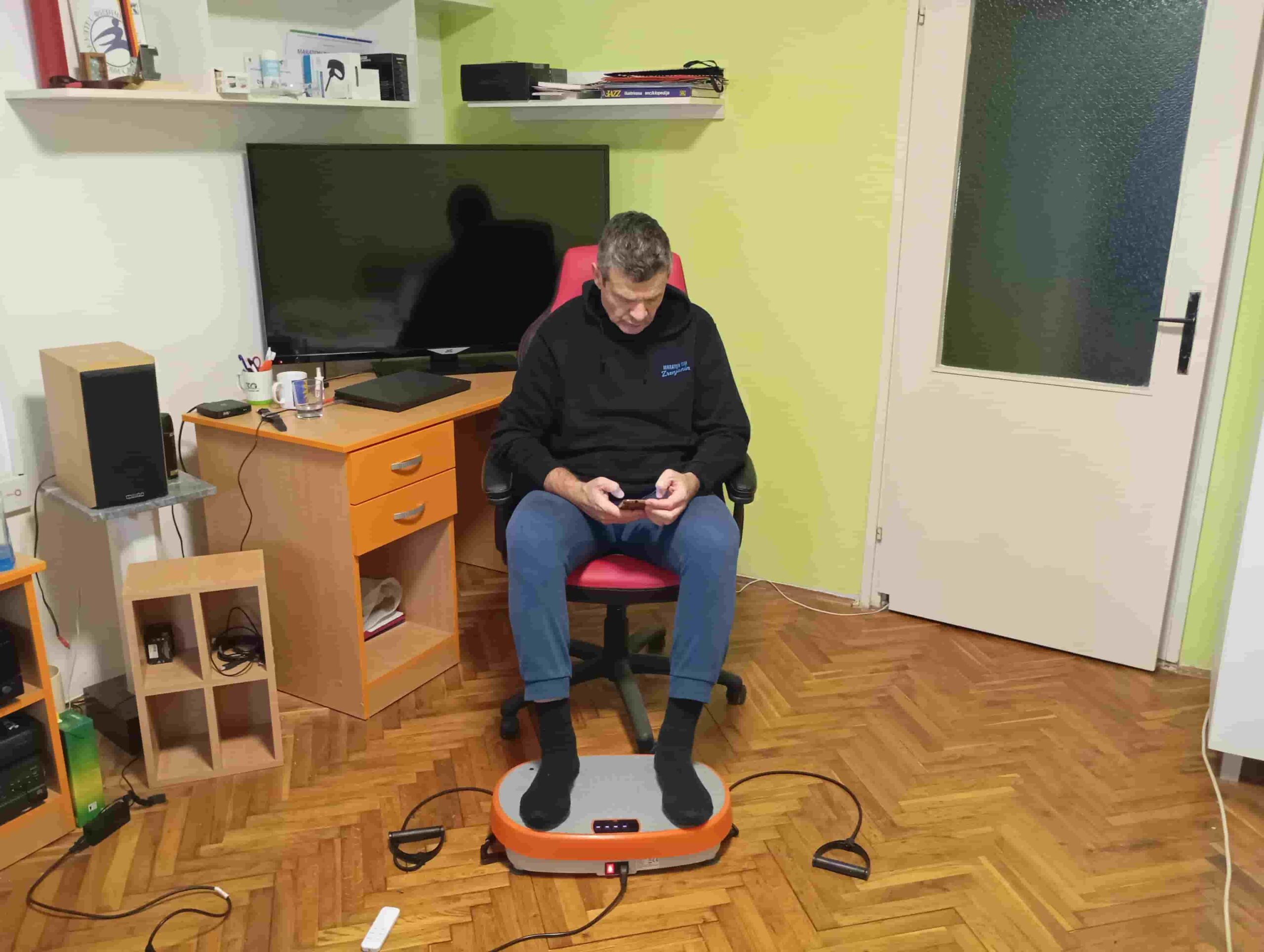 Vladimir Stanar sitting in an office chair lower legs relaxed low vibration setting Vladimir Stanar sitting in an office chair lower legs relaxed low vibration setting