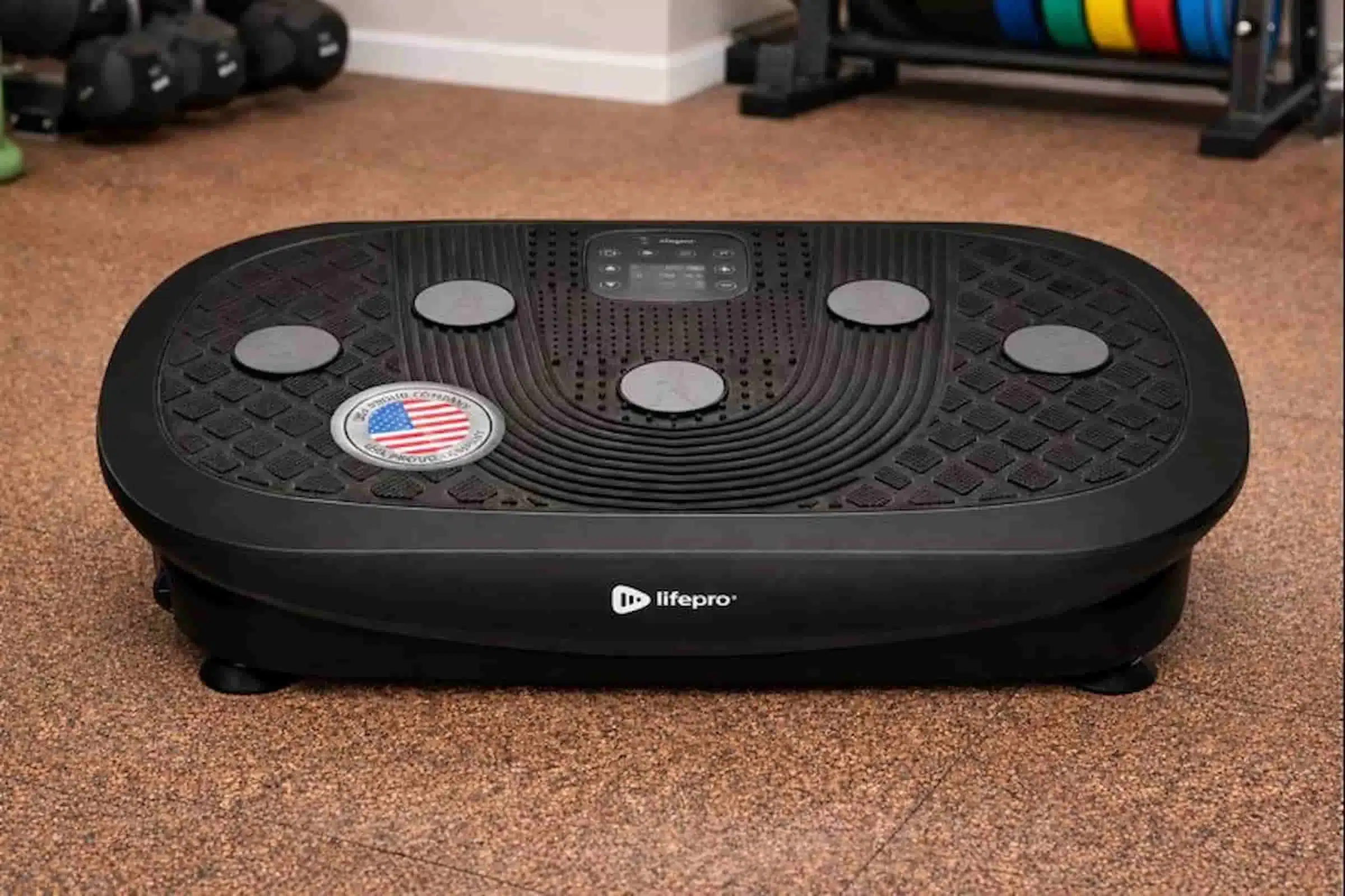 Lifepro Rumblex 4D Plus vibration plate Lifepro Rumblex 4D Plus vibration plate on a home gym floor