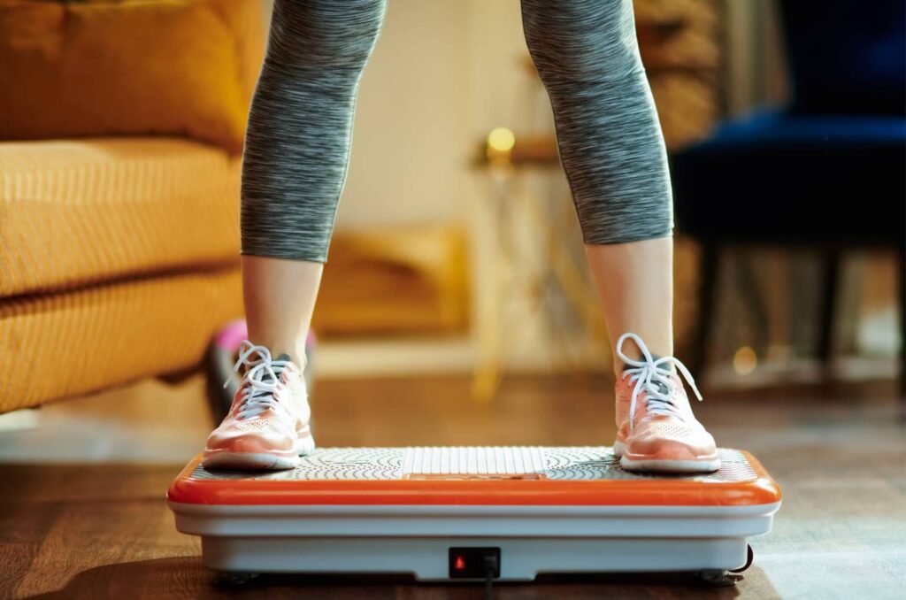 A person on the vibration plate